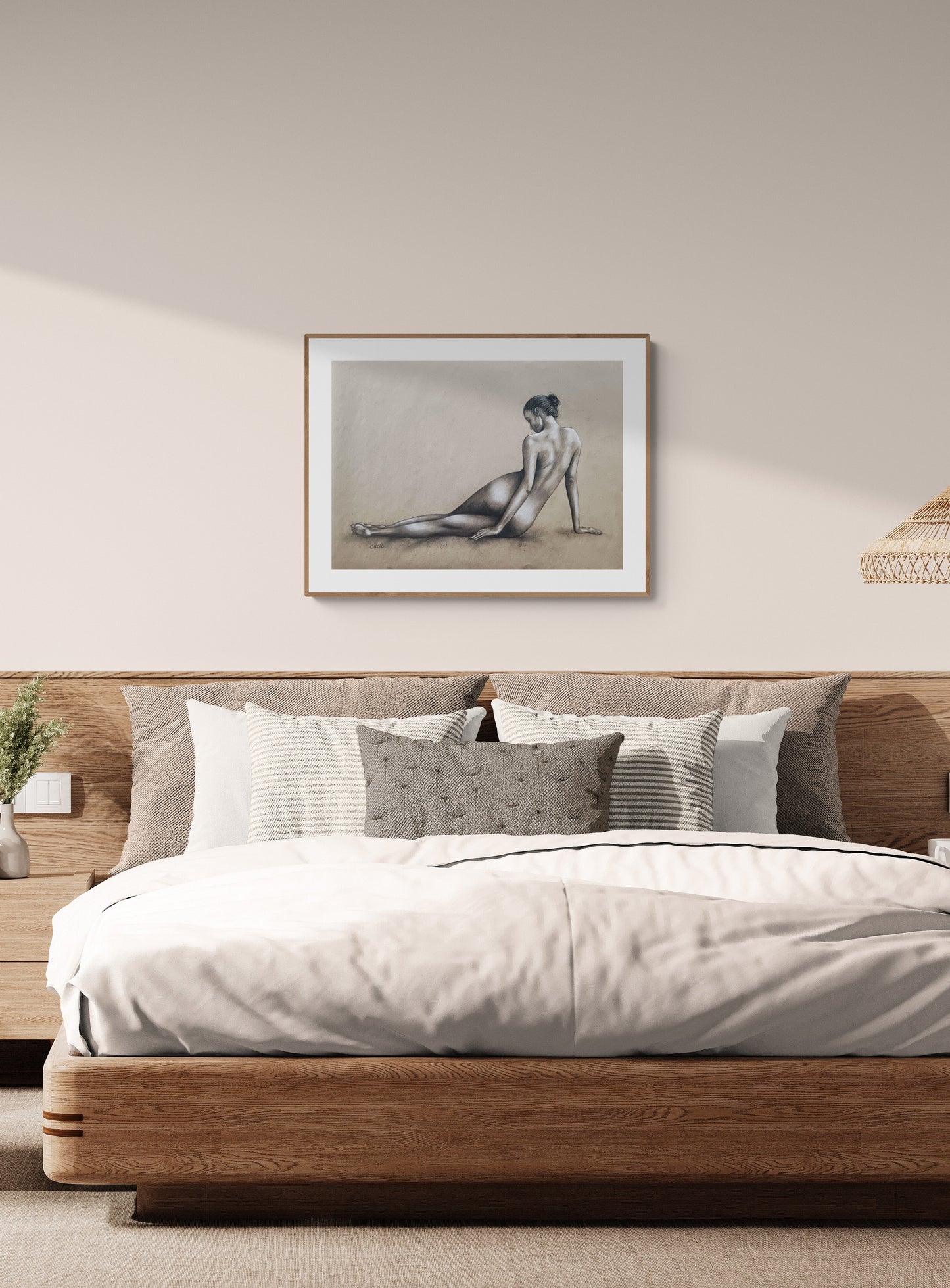 Bedroom with wooden bed, white bedding, and framed artwork on the wall.