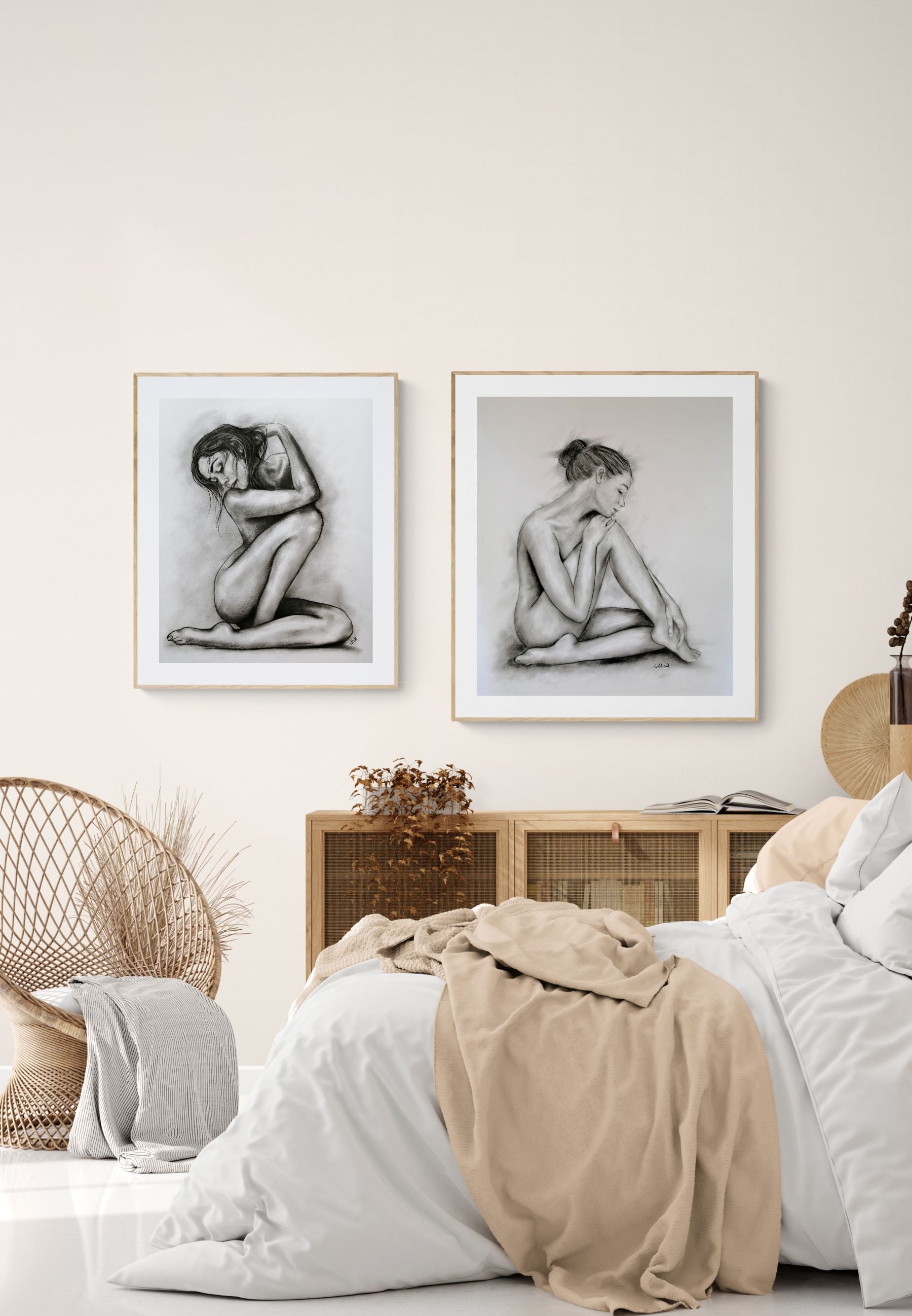 Bedroom with framed black and white artworks on the wall