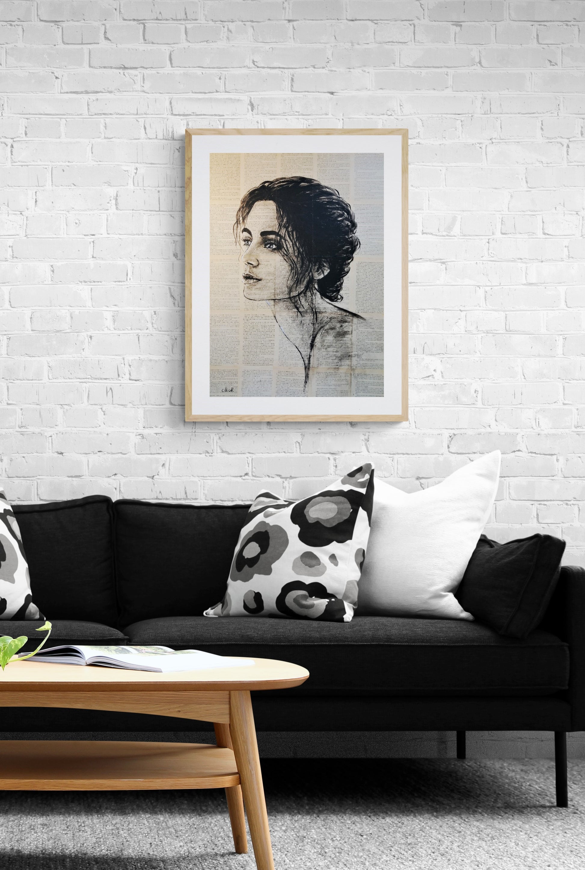 This monochromatic profile portrait is a striking piece of recycled wall art, blending sustainability with contemporary style.

Portrait is crafted with acrylic paint on book pages, glued to canvas to create a&nbsp;layered, textured effect. I love the idea of giving old pages new life—each piece carries whispers of untold stories and a sense of timelessness.