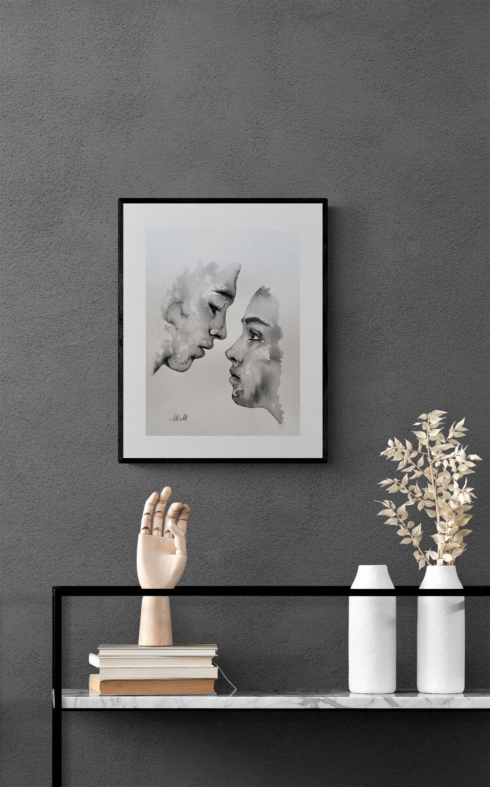 Celebrate the beauty of love through simplicity.
Lovers Kiss is a minimalist ink painting that captures an intimate moment - two souls meeting in a timeless embrace. With just water and a touch of black pigment, the piece reveals how little it takes to express everything.

Printed on natural white, matte, heavy art paper, each artwork carries a quiet elegance and organic texture that complements any modern or romantic interior.
Perfect as bedroom wall art, a wedding or anniversary gift, or a heartfelt prese