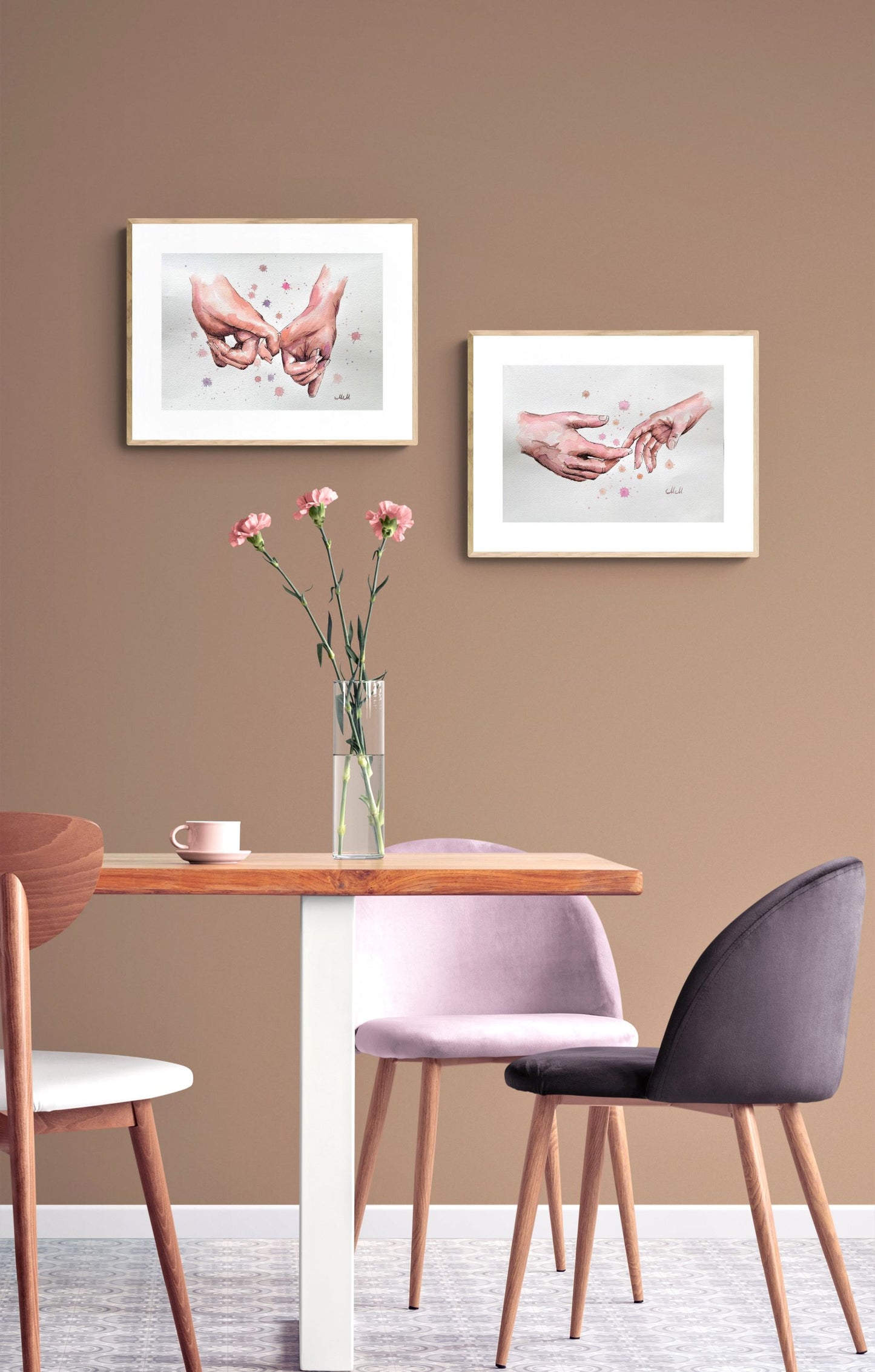 Dining room with a table, chairs, and framed artwork on a beige wall.