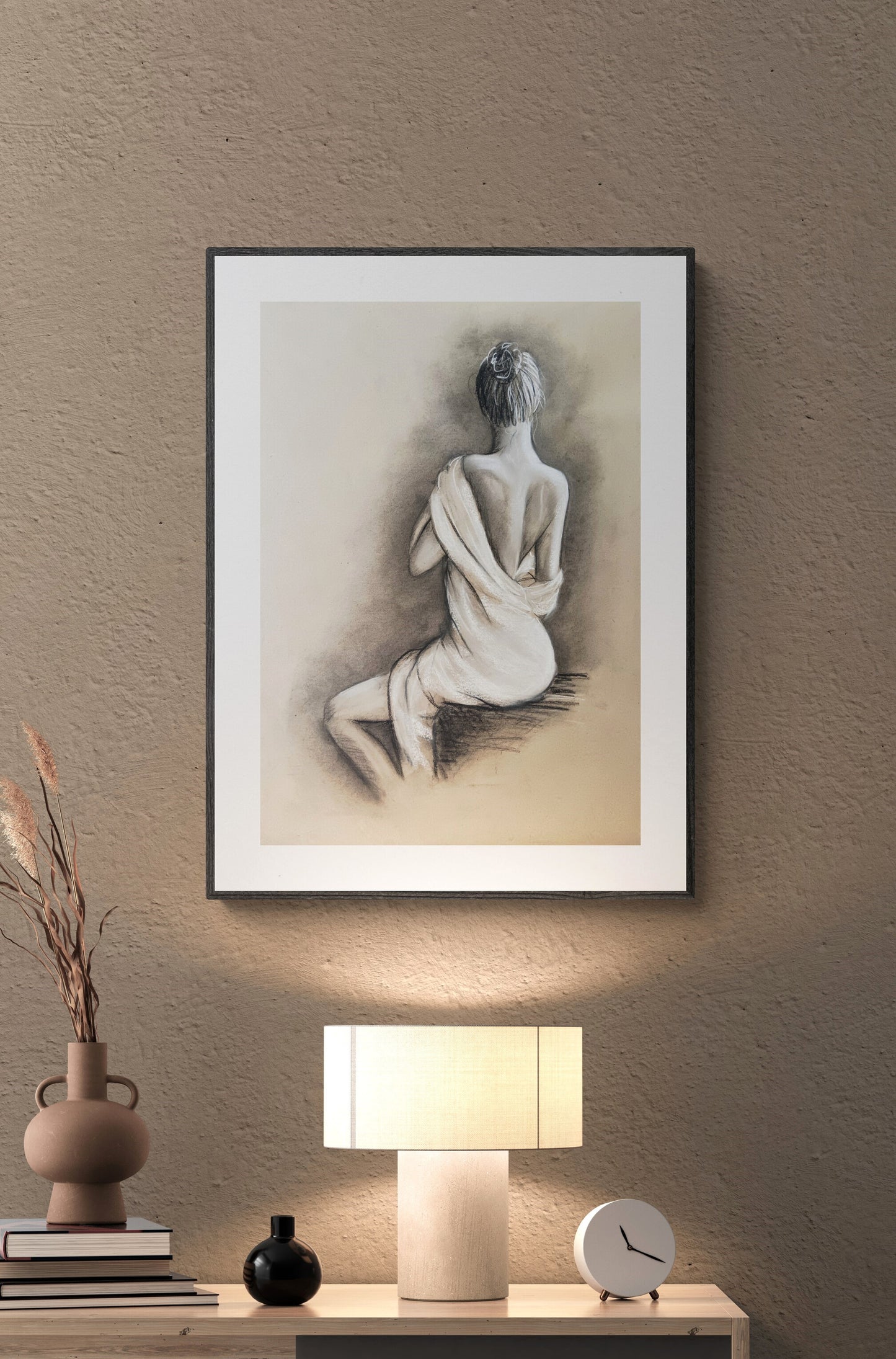 This charcoal figure drawing is a delicate balance of sensuality and subtlety, making it the perfect above-bed artwork to bring a romantic and sophisticated atmosphere to your bedroom.

Sketched on recycled beige art paper, this vintage-style nude captures the elegance of the female body with graceful charcoal strokes. The interplay of light and shadow enhances its timeless appeal, making it an intimate yet refined piece for bedroom and bathroom wall.