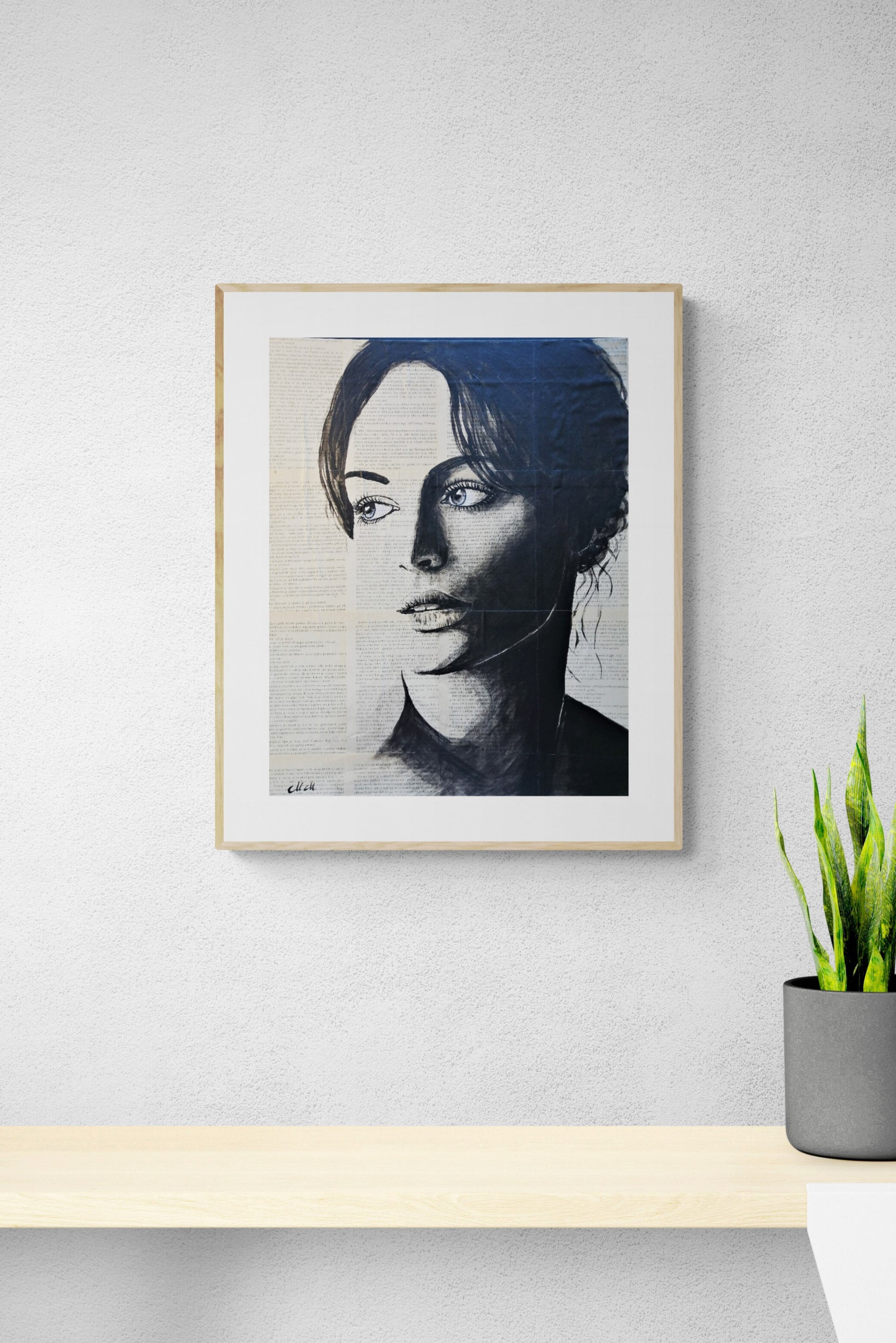 Book Collage Portrait Art – Mixed Media Minimalist Artwork

As a book lover and artist, I find inspiration in the beauty of old pages and the stories they tell. This book collage portrait is a unique blend of mixed media art, perfect for a modern minimalist home.

This chic lady newspaper art is an original black and white portrait painting, created with acrylic paint on book sheets, which are glued to thin wooden panel. The result is a striking fusion of literature and contemporary art.