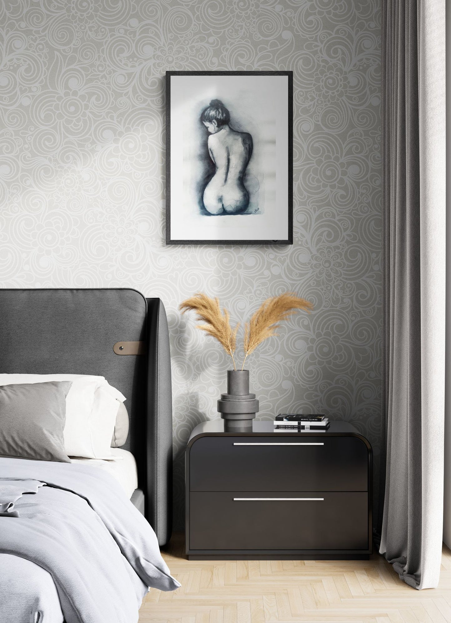 Modern bedroom with gray upholstered headboard, black nightstand, and framed artwork on wall.