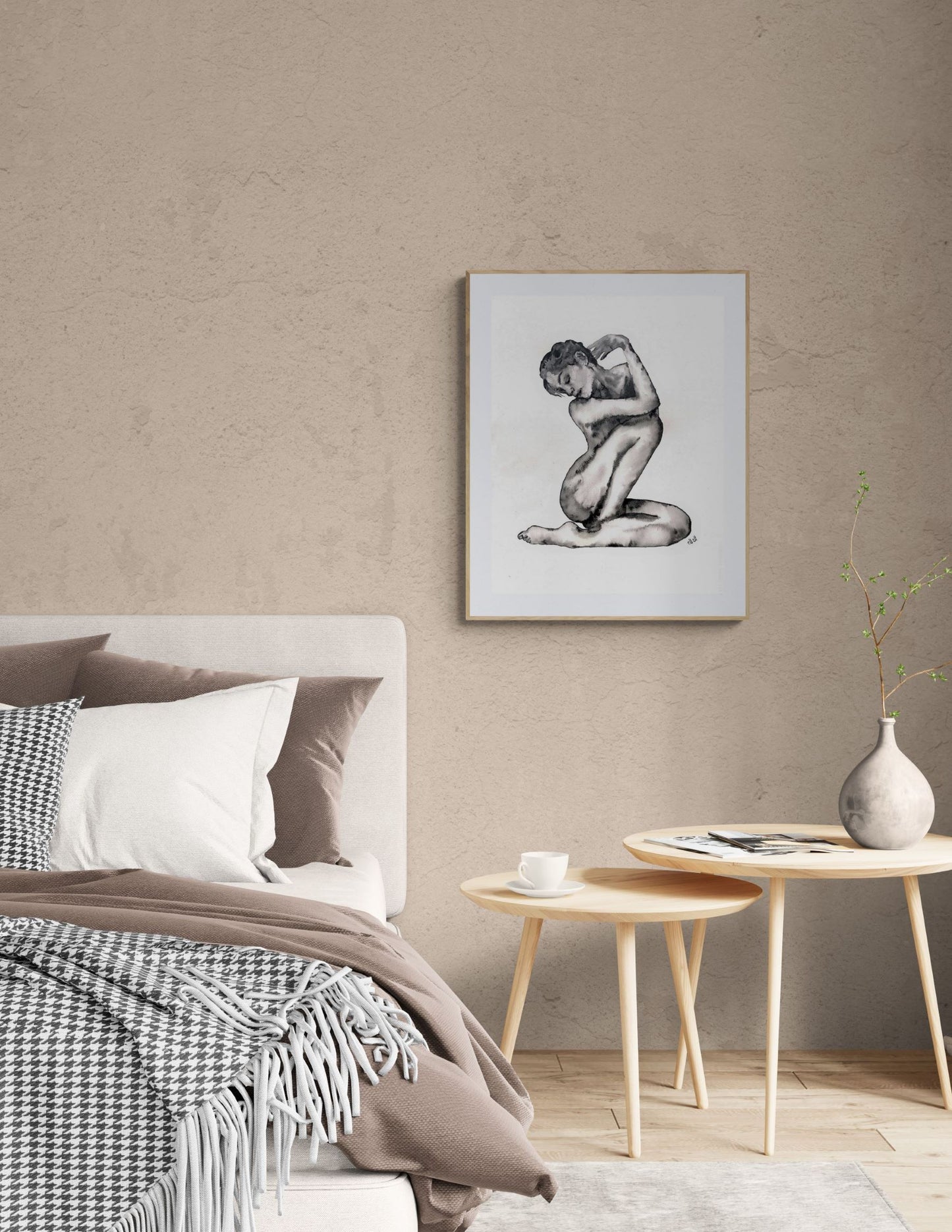 Modern bedroom with a bed, side tables, and a wall art piece.